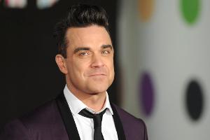 Robbie Willimas ist ein gern gesehener Gast auf dem roten Teppich