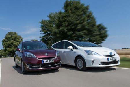 Renault Gr. Scénic 1.5 dCi Dynam., Toyota Prius Plus Life, Frontansicht