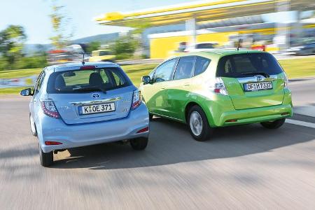 Honda Jazz 1.3 DSi i-VTEC IMA Exclusive, Toyota Yaris 1.5 VVT-i Hybrid Life, Heckansicht