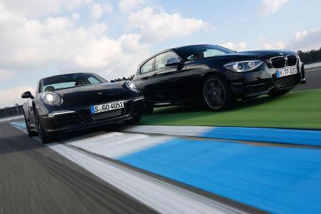 Porsche 911 Carrera 4, BMW M135i xDrive,