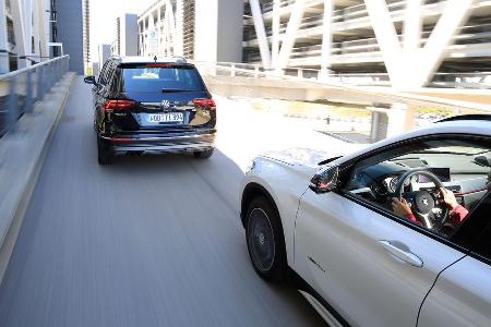 BMW X1 xDrive 20d, VW Tiguan 2.0 TDI 4Motion, Heckansicht