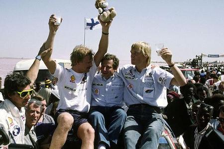 Juha Kankkunen, Jean Todt und Ari Vatanen vom Peugeot-Team.