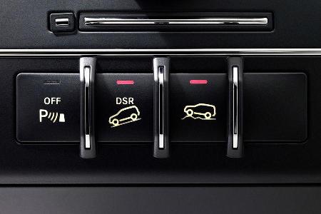 Bergabfahrhilfe und der Knopf für das Geländefahrprogramm bleiben dem GLK vorbehalten.