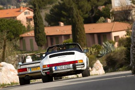 Mercedes 500 SL, Porsche 911 Carrera Cabriolet, Heckansicht