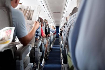 Im Inneren eines Flugzeugs - passengers in an airoplane BLWX...