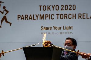 Paralympisches Feuer in Tokio eingetroffen - Corona-Zahlen steigen