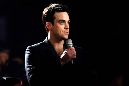 ...Ausstieg arbeitete Robbie fleißig an seiner Karriere als Solokünstler, zunächst mit mäßigem Erfolg. Doch 1997 gelang dem ...