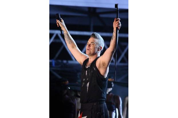 'Let Me Entertain You' – dieses Versprechen aus seinem 1998 erschienen Songtitel hat Robbie Williams eingehalten. Und ein En...