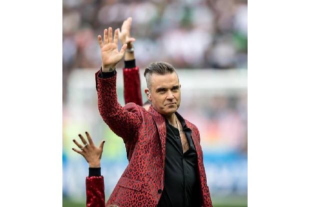 Robbie Williams ist so von den kleinen grünen Männchen fasziniert, dass er sogar einmal darüber nachdachte, seine Sangeskarr...