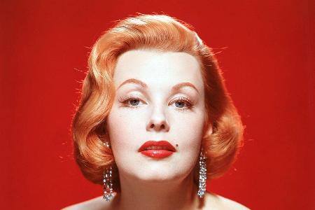 Markenzeichen von Arlene Dahl waren ihre feuerroten Haare.