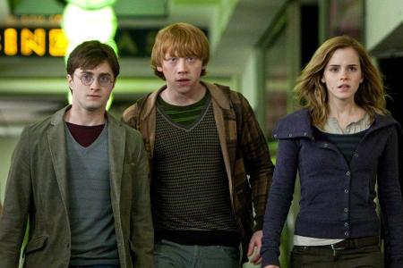 Daniel Radcliffe, Emma Watson und Rupert Grint spielten die Hauptrollen in den 