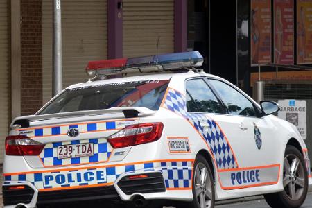 Mit dem Muster der bayrischen Flagge beklebt ist ein Polizeiwagen in Brisbane, Australien.