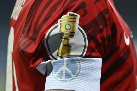 DFB nutzt Pokal-Halbfinale für Friedensappelle