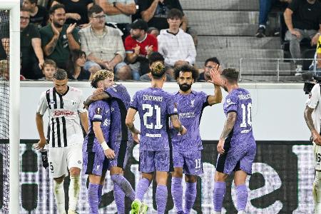 Liverpool und Rom mühen sich zu Auftaktsiegen