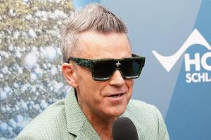Robbie Williams: Überraschungsgast auf RWE-Jubiläumsparty