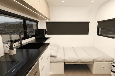 Werbefotografien des Herstellers zeigen den Lifestyle-Caravan Coast Model 1 von innen und von außen