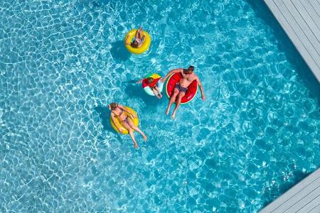 Family in pool. Aerial picture
