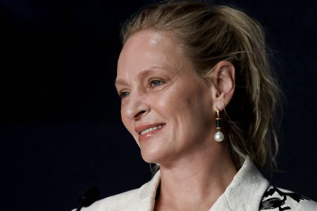 Portrait einer lächelnden Frau mittleren Alters