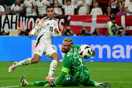 EM-Traum lebt: DFB-Team trotzt Dänen und Donnerwetter