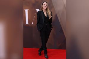 Im eleganten Herrenanzug: Angelina Jolie strahlt in London