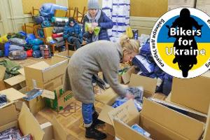 Volunteers sort humanitarian aid in the western Ukrainian 