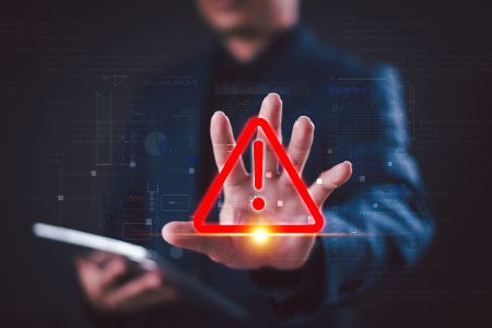 Warnsymbol mit ausgestreckter Hand