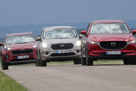 Ford Kuga 2.0 TDCi 4x4, Kia Sportage 2.0 CRDi 4WD, Mazda CX-5 D 175 AWD, Exterieur