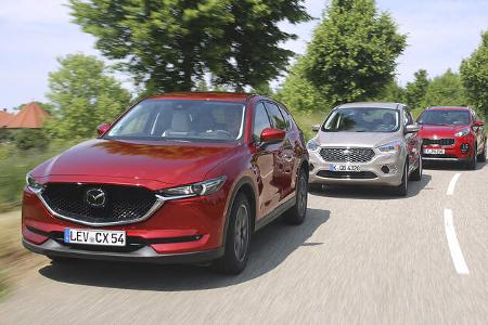 Ford Kuga 2.0 TDCi 4x4, Kia Sportage 2.0 CRDi 4WD, Mazda CX-5 D 175 AWD, Exterieur