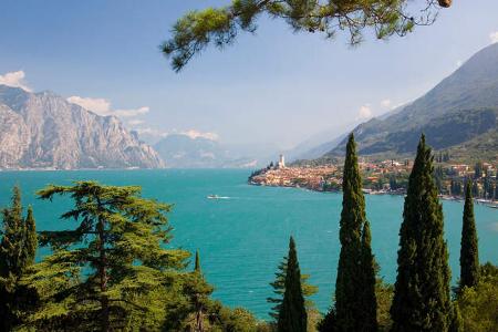 Outlook to village of Malcesine across turquoise waters of Lake Garda.