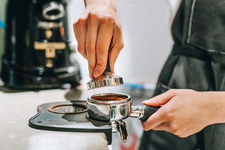 Tamping des Espressopulvers