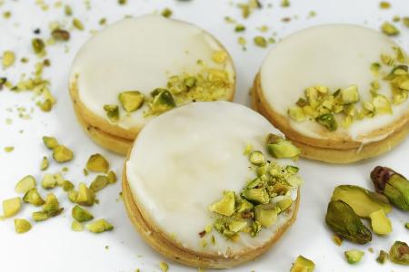 Edler Genuss: Pistazien-Doppelkekse mit cremiger Füllung