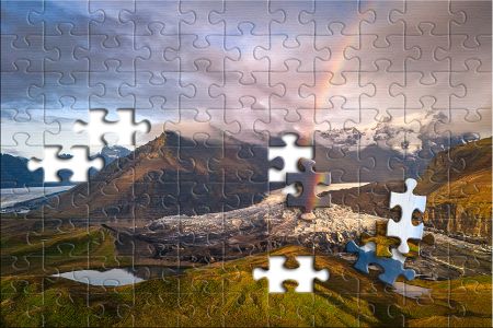 Puzzle: Regenbogen über einem Gletscher in Island