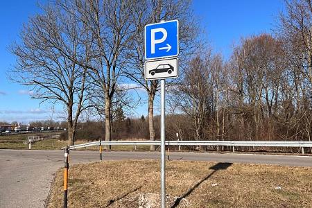 Road signs E-car charging station Harbour Motorway service area Zillertal Ost Interpretations between Füssen and Ulm