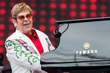 Reginald Kenneth Dwight alias Elton John