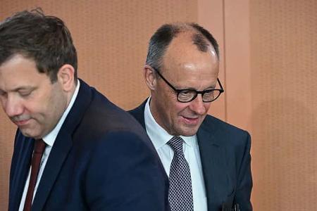 Lars Klingbeil (SPD) und Friedrich Merz (CDU)