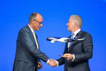 Kanzler Merz und Lufthansa-Chef Spohr. 