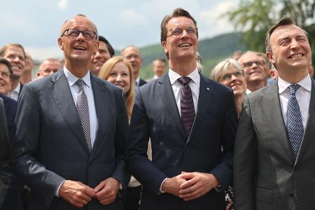 Als sei nichts gewesen: Merz, Wüst und Ziemiak.