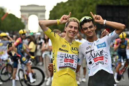 Pogacar und Del Toro feiern nach der Tour de France