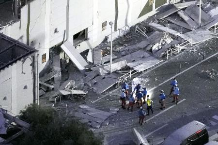 Laut Japans Regierung kamen mindestens 13 Menschen infolge des Bebens ums Leben. 