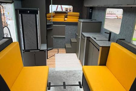 Bis zu 45 Prozent Gewicht spart die E-Wohnmobilstudie durch den Möbelaufbau aus Leichtbaumatreial von Vöhringer.